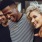 a man and a woman smiling