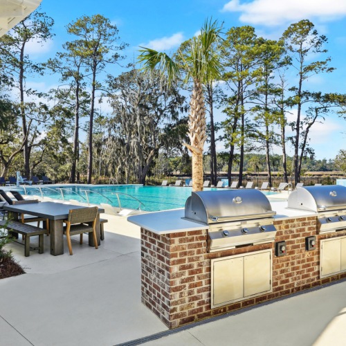 Poolside Kitchen and Lounging Area Poolside Kitchen and Lounging Area